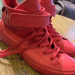 All red leather converse with strap